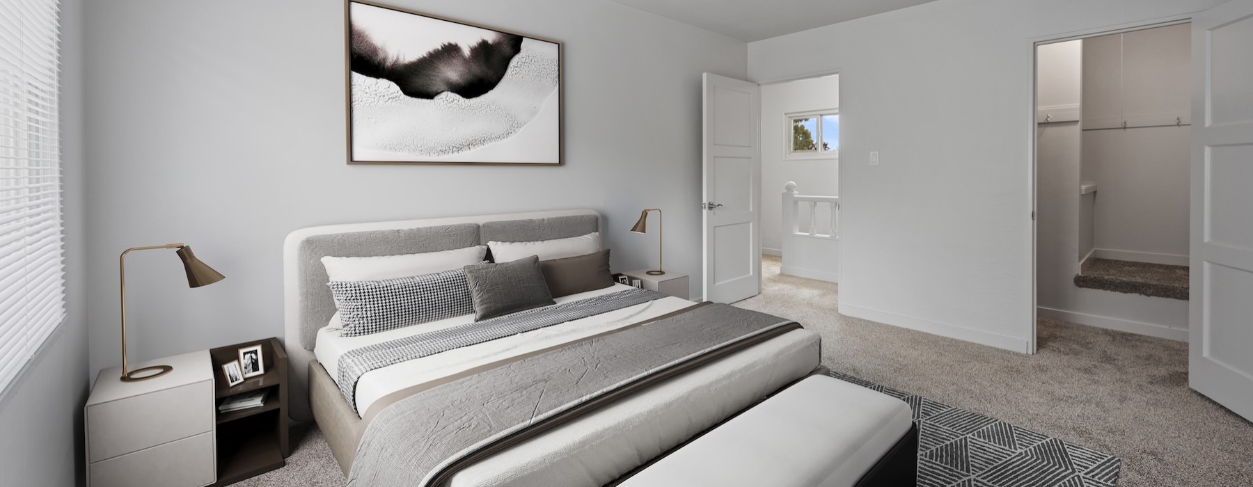 a bedroom with a bed and two nightstands