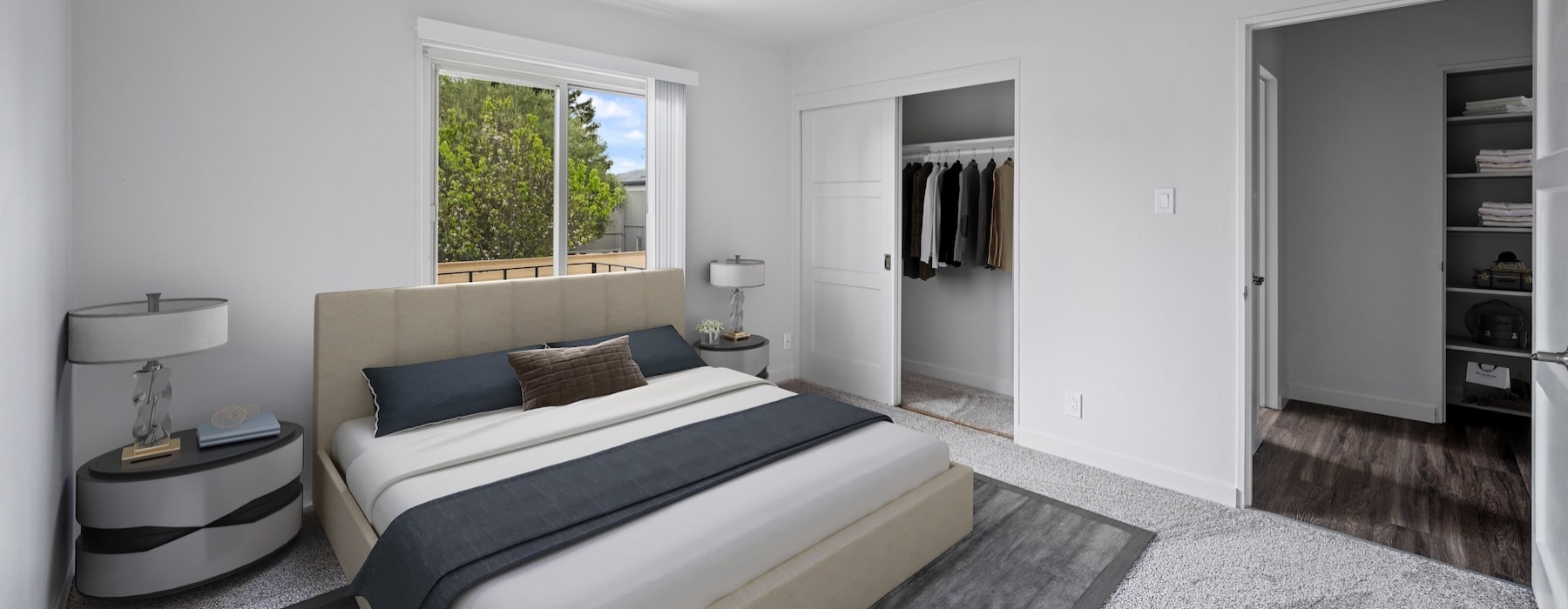a bedroom with a bed and two nightstands